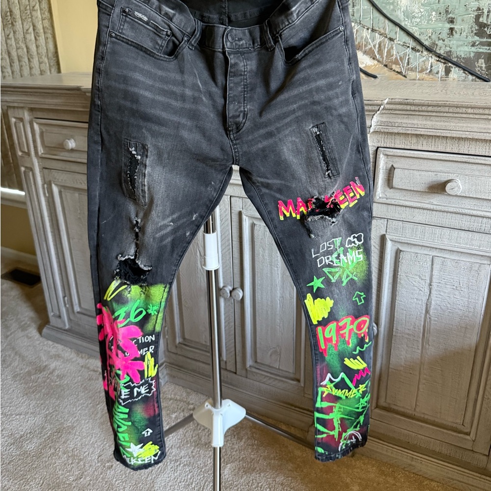Black Skinny Jeans with Vibrant Graffiti Art